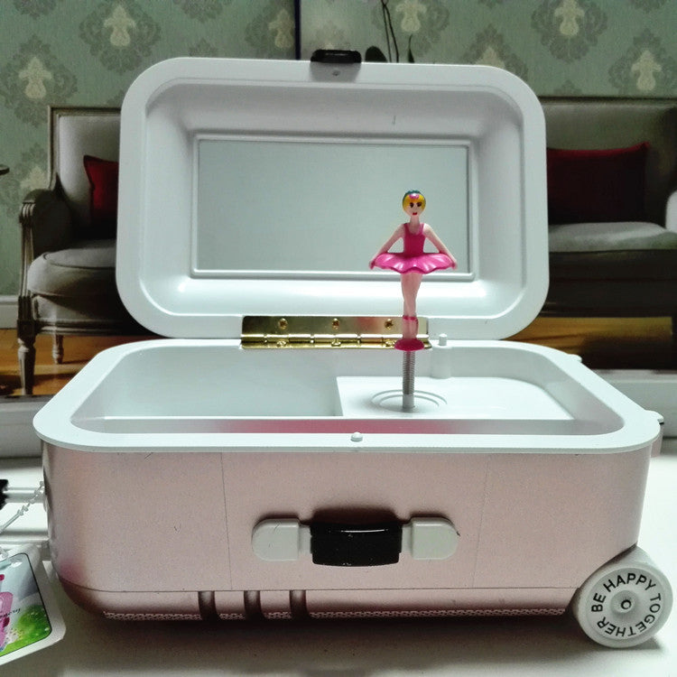 Music Box, Suitcase, and Toys
